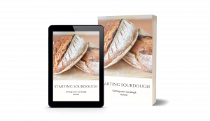 Image of the free e-book starting sourdough on a tablet and in real book form