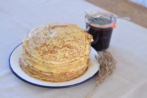 Einkorn Pancakes with a jar of blueberry jam
