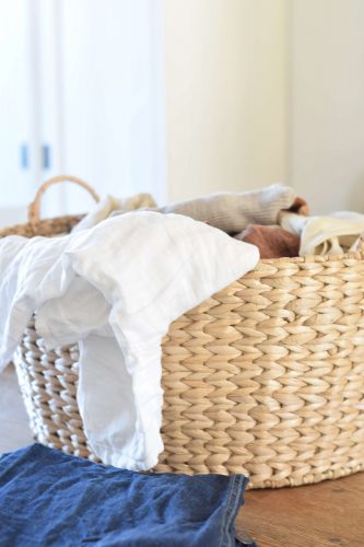 Laundry basket on a wooden table.