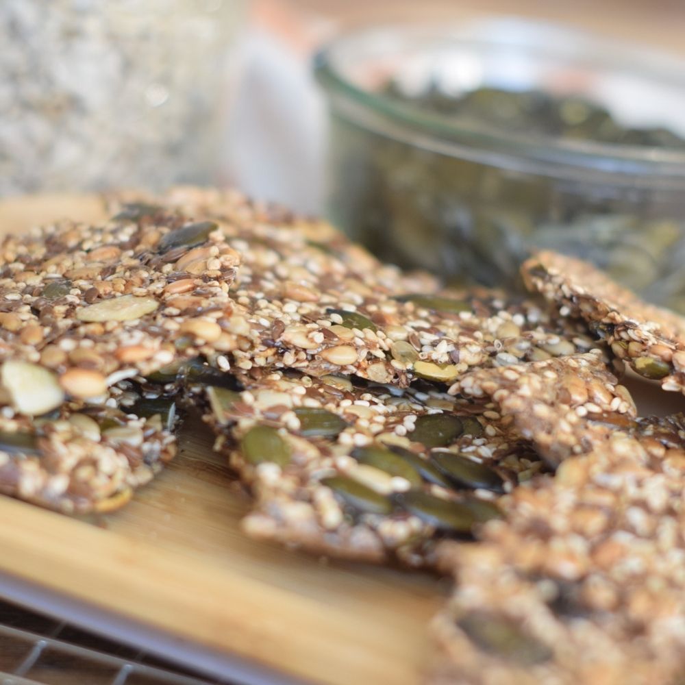 Seed Crackers on a bamboo board.